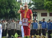 Berpakaian Adat Mentawai, Pj Walikota Padang Pimpin Upacara Hari Sumpah Pemuda di Lapangan Apeksi
